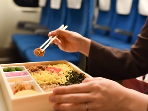 Eating Ekiben in a train